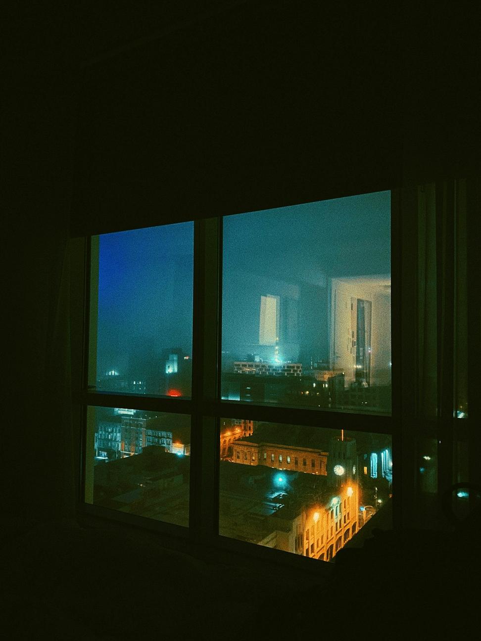 Luxury hotel room with storm view
